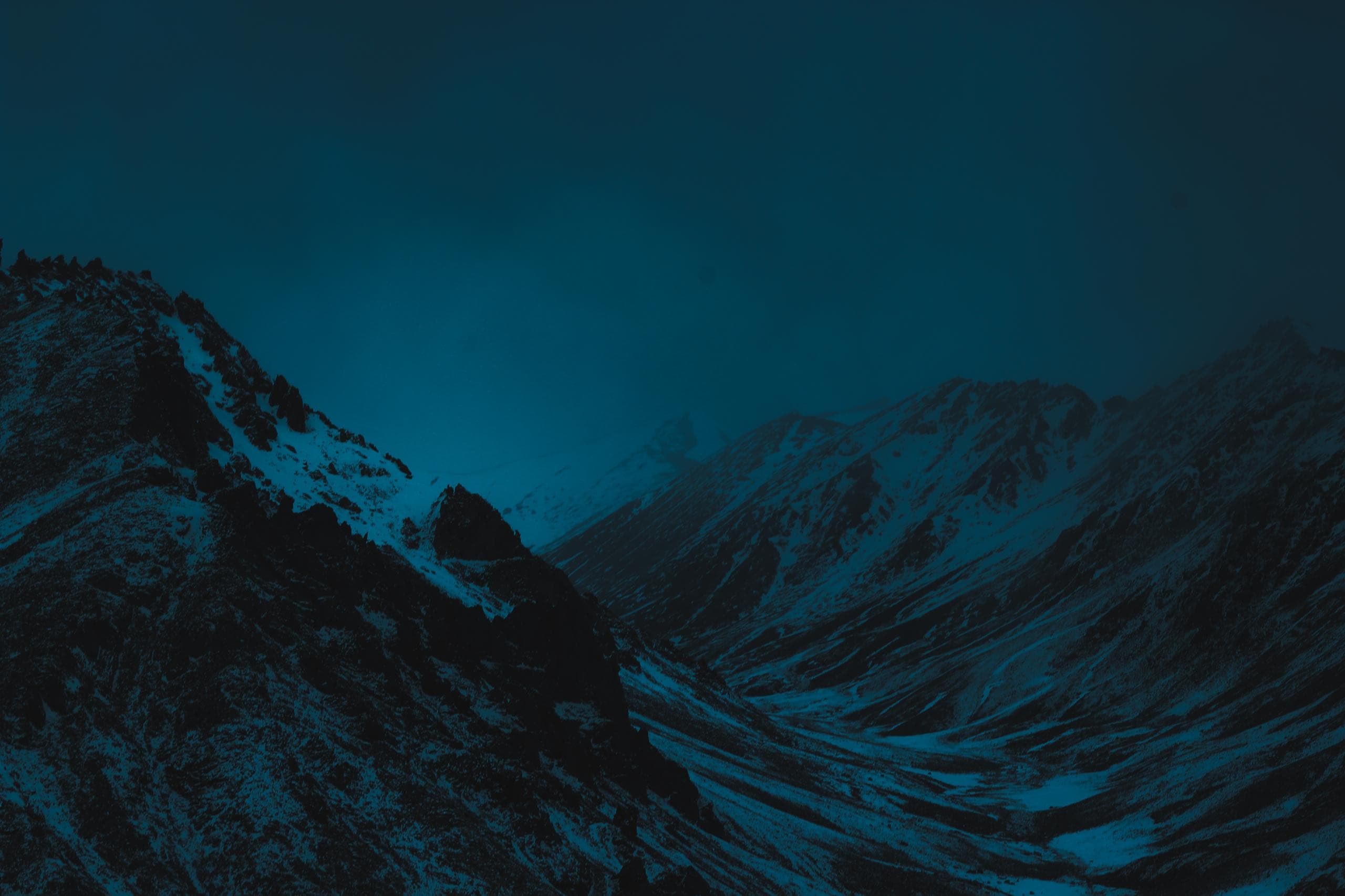 Snowy mountains at night